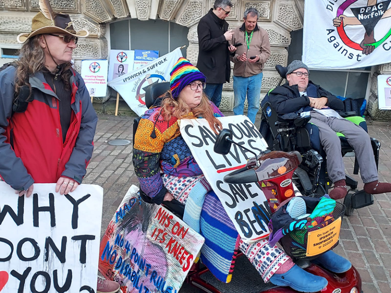 DPAC members holding plackards in Ipswich