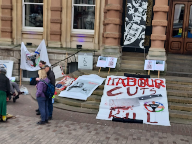 Various banners laid out on the town hall steps in Ipswitch